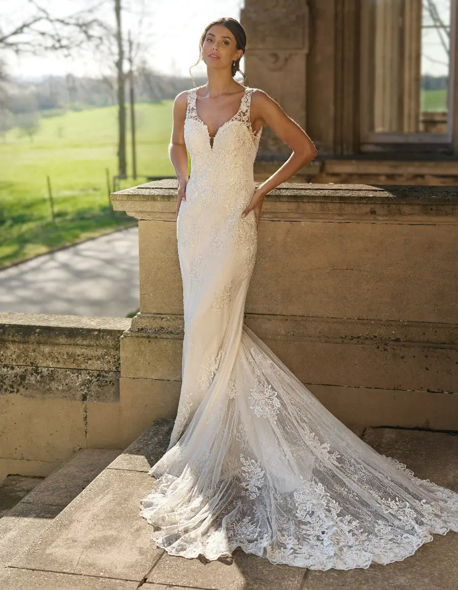 DingJiDress striking sheath with straps and draped beaded back